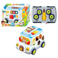 Музичний бізібус 45585 (12) “WToys”, 2 види, ОЗВУЧ. УКР. МОВОЮ, каталка, світло, пісні, ноти, мелодії, кілька режимів, сортер, шестерні, в коробці