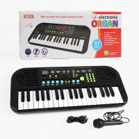 Синтезатор (BD 9900) 37 клавіш, мікрофон, мелодії, запис та відтворення звуків, працює від мережі та батарейок, барабани, звуки тварин, світло, в коробці