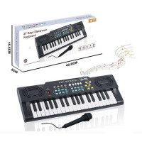 Синтезатор (R 669) 37 клавіш, мікрофон, працює від мережі або батарейок, звуки, мелодії, регулювання гучності, функція запису, в коробці